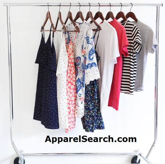 Women's dresses, blouses and tops in a mix of prints and solid colors hanging on a clothing rack