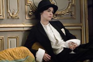 Coco Before Chanel : Coco Chanel dressed like a man at a party