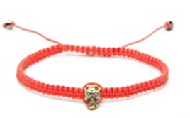 Chloe W tangerine color bracelet with skull