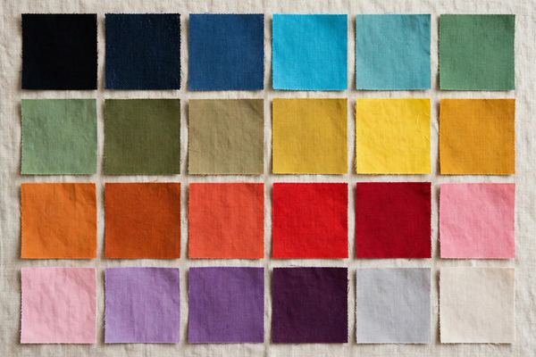 Fabric swatches in dye colors arranged as a color card