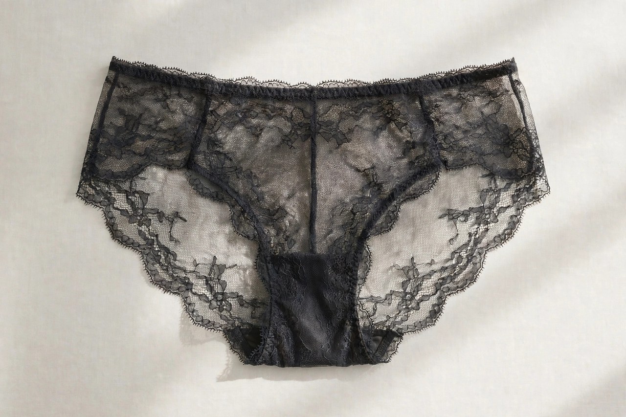 Women's sheer underwear shown as a flat lay product photograph, garment only, no people