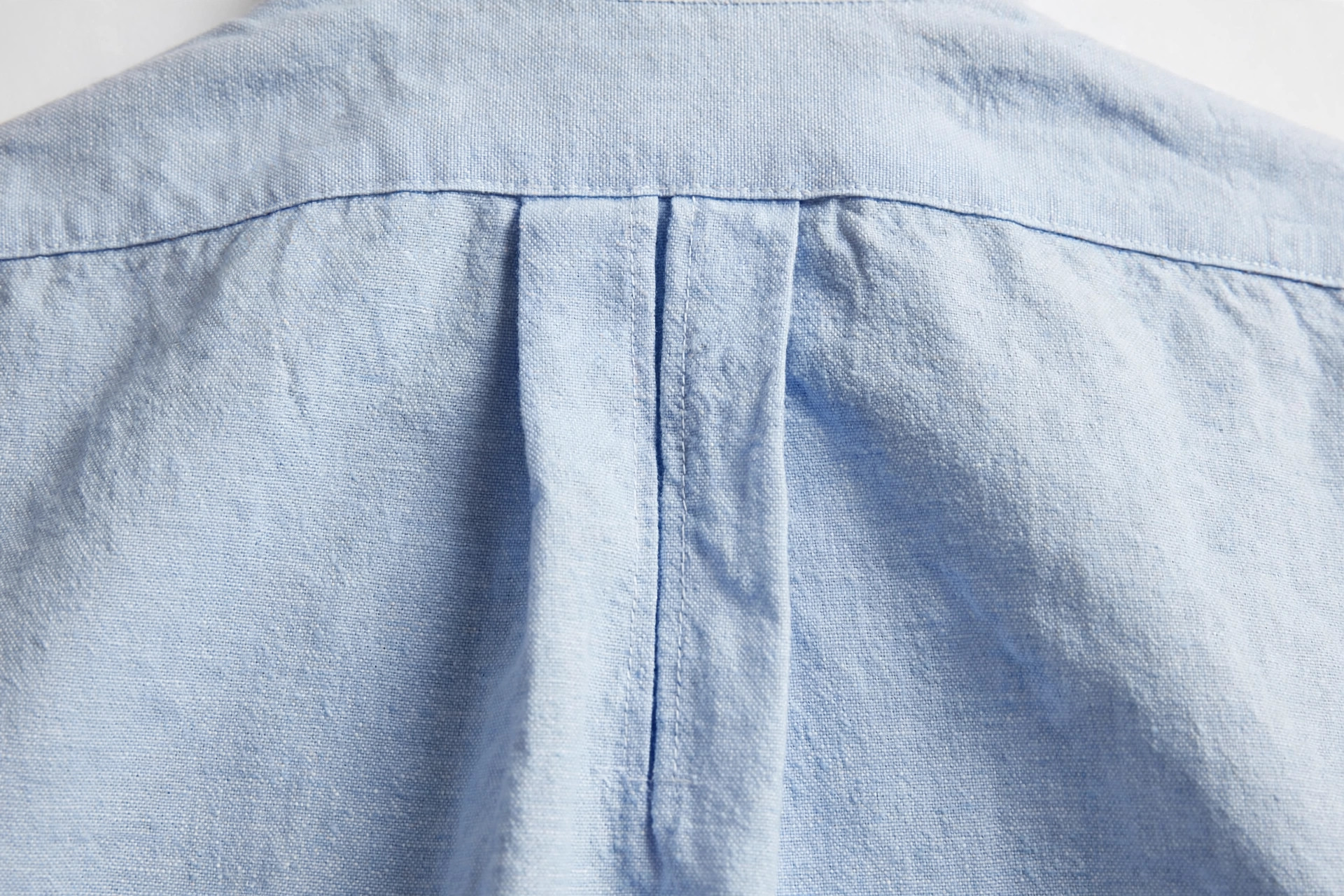Close-up of a box pleat at the back of an oxford shirt