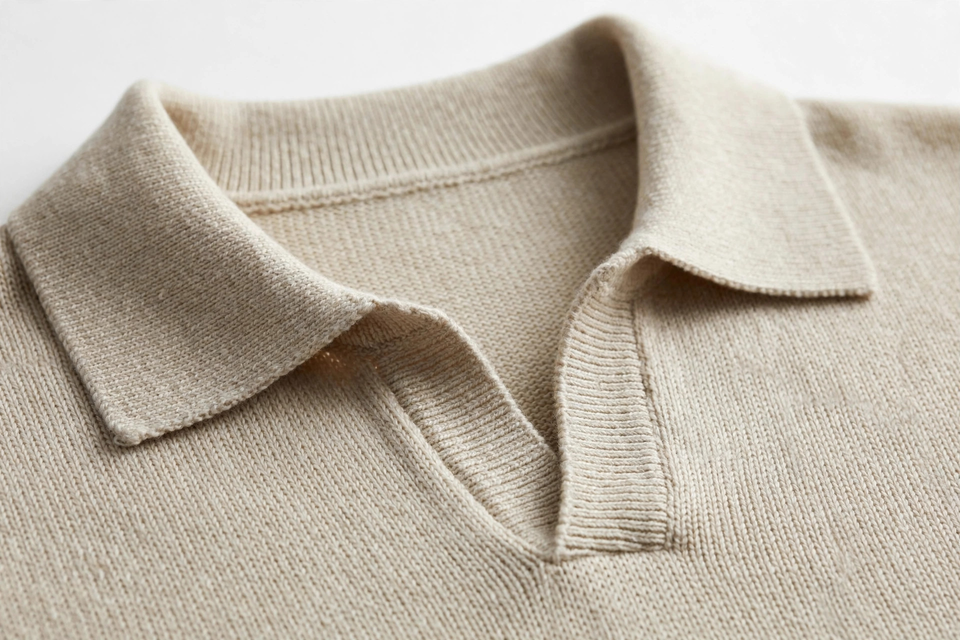 Close-up of a Johnny collar with a small open V on a knit polo top