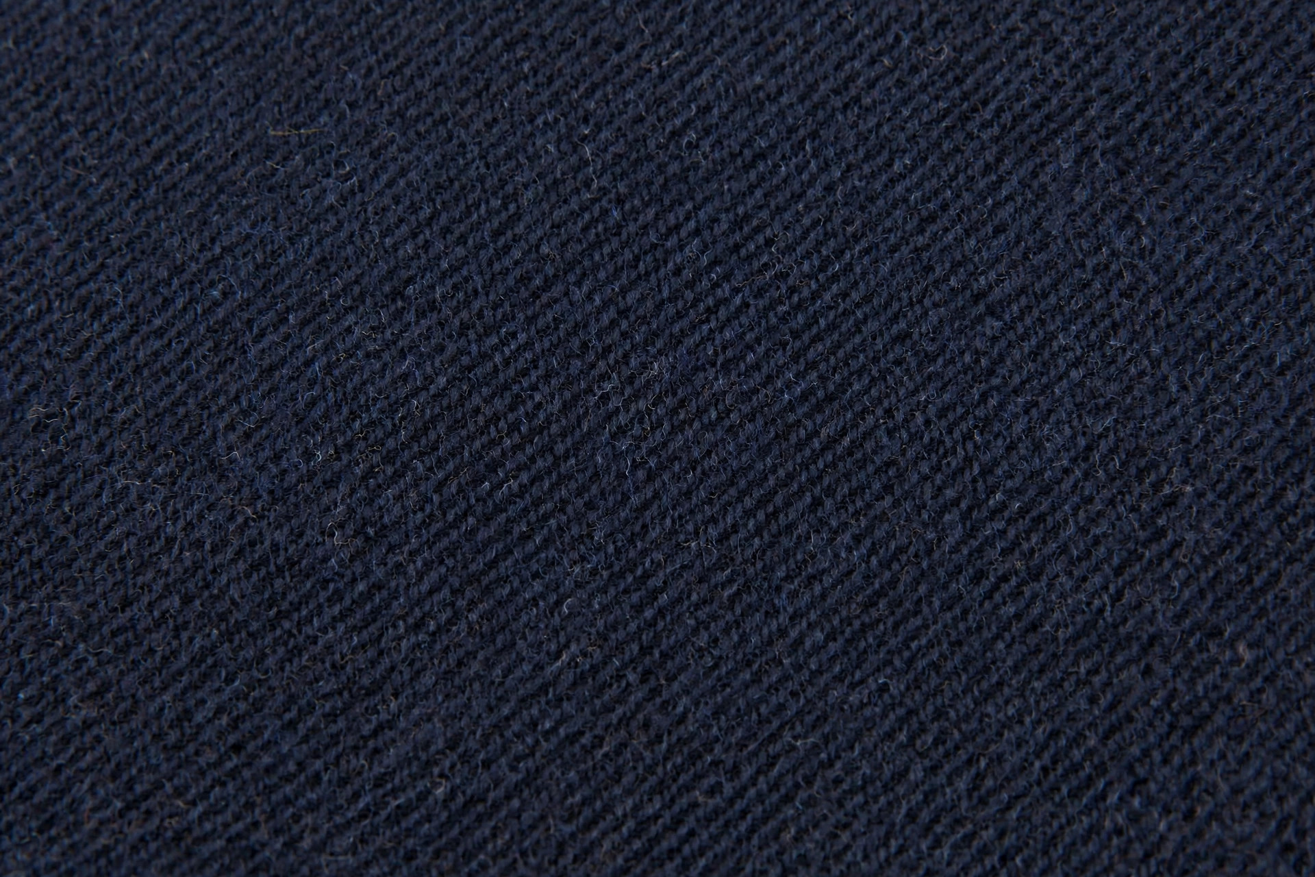 Dark navy kersey wool twill fabric with a smooth fulled finish