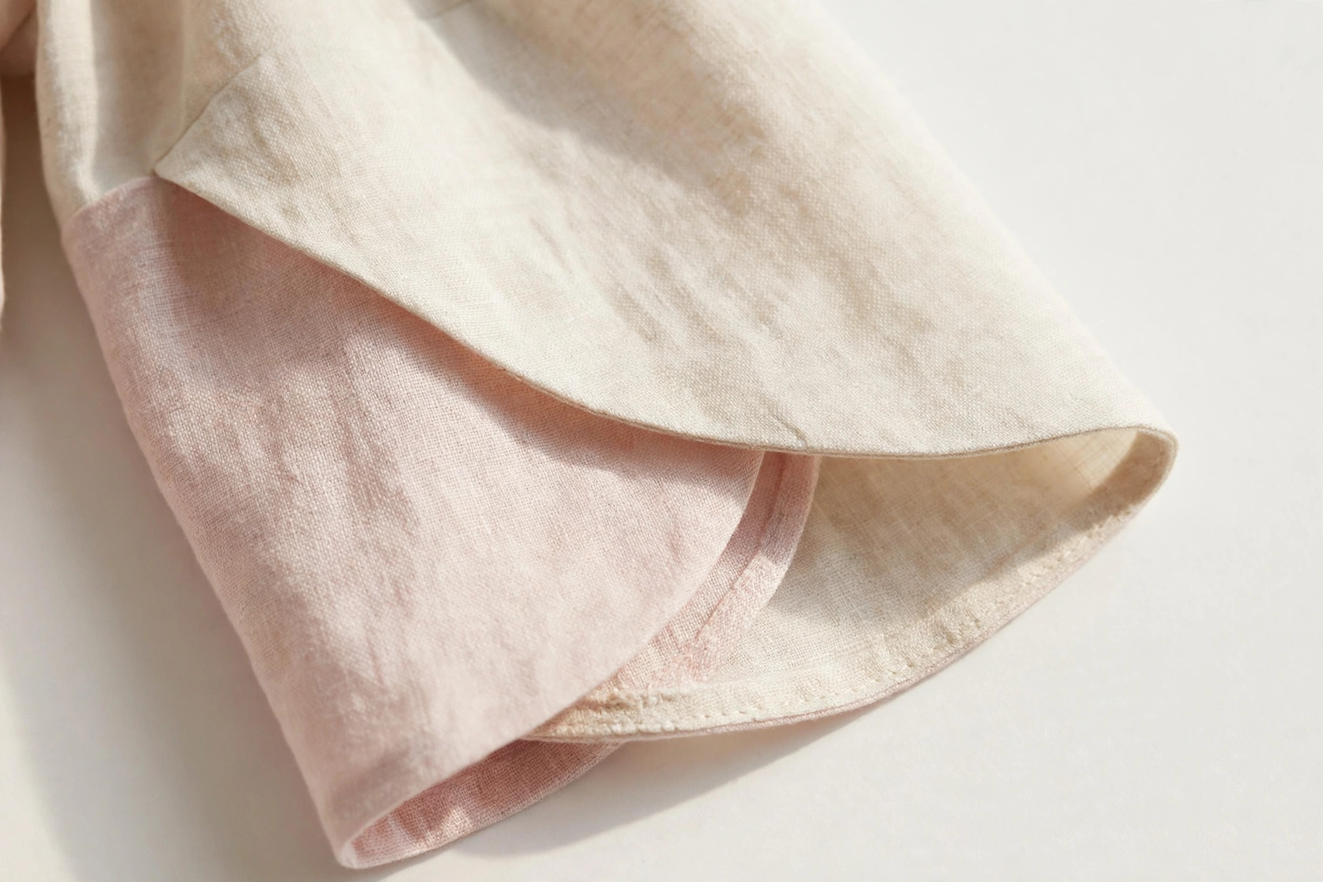 Close-up of a petal sleeve with two overlapping panels on a summer dress