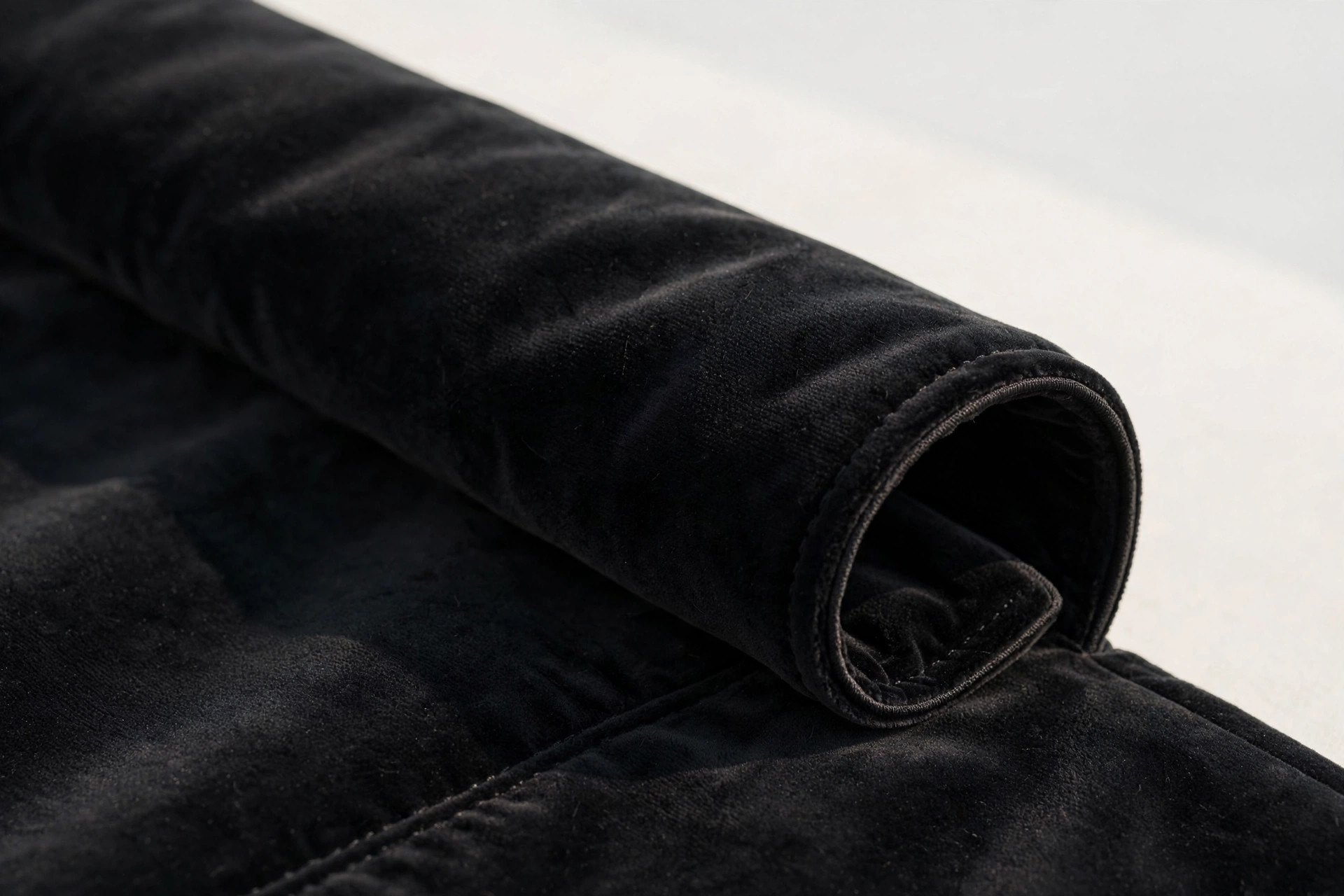 Close-up of a shawl collar rolling in one continuous line on a dinner jacket