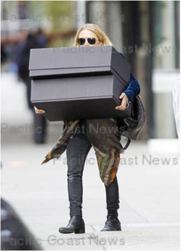 Ashley Olsen Behind Box wearing Earnest Sewn