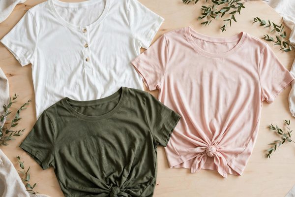 Women's t-shirts with button front and knot front details in a flat lay